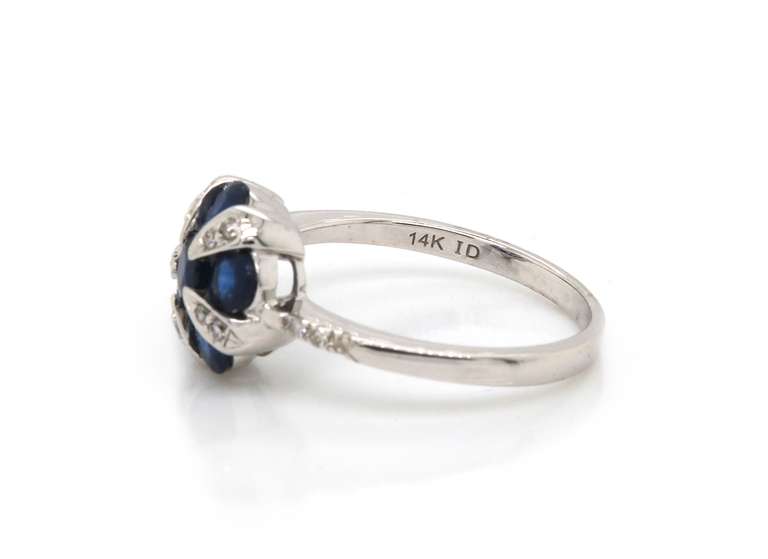 Eye-catching 14kt White Gold Sapphire & Diamond Flower Ring