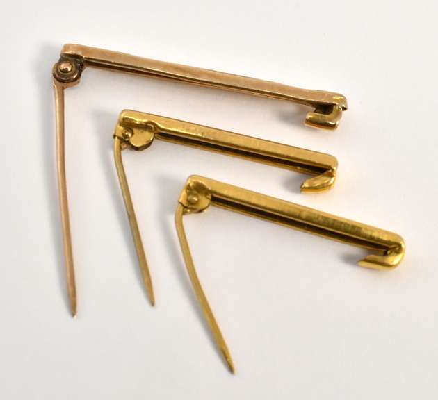 Three Antique Gold Lingerie Clips