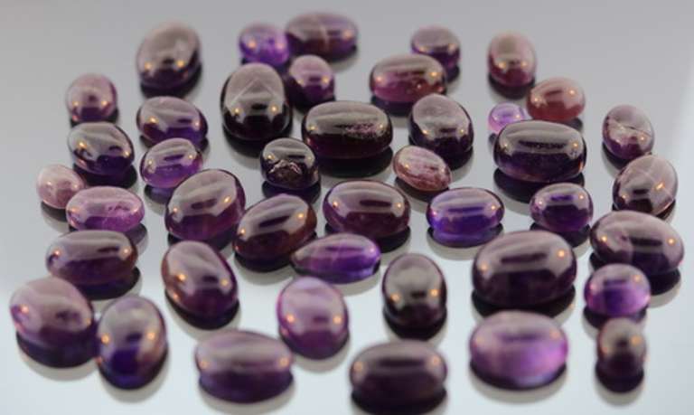 Huge! 293ct collection of deep violet Amethyst cabochons