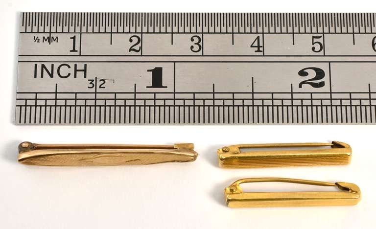 Three Antique Gold Lingerie Clips