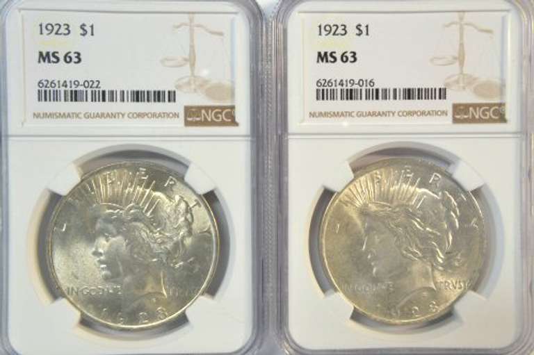 2 Blazing Choice BU 1923 Peace Silver Dollars. NGC MS63