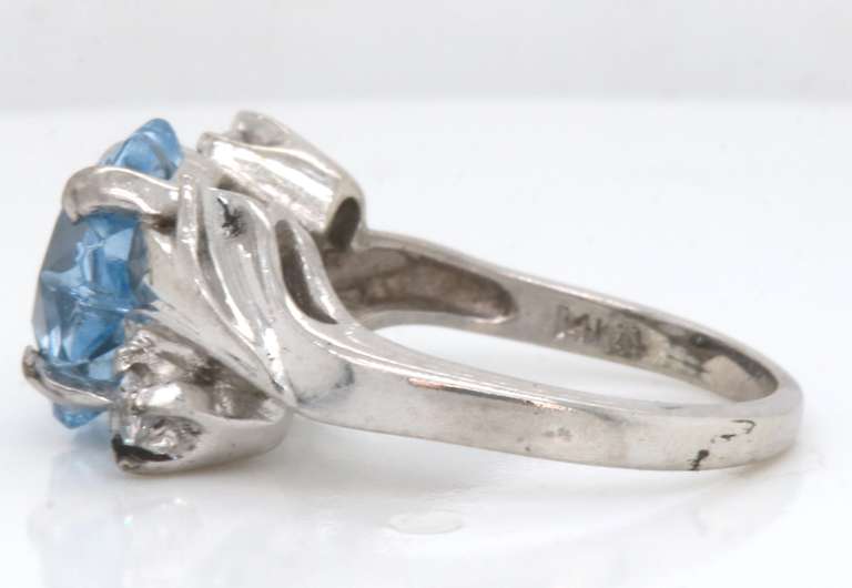 Pleasing White Gold Blue and White CZ Star Ring