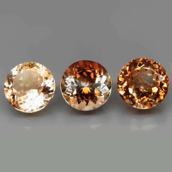 Matched! 3 piece 14.12ct full fire Imperial Topaz set