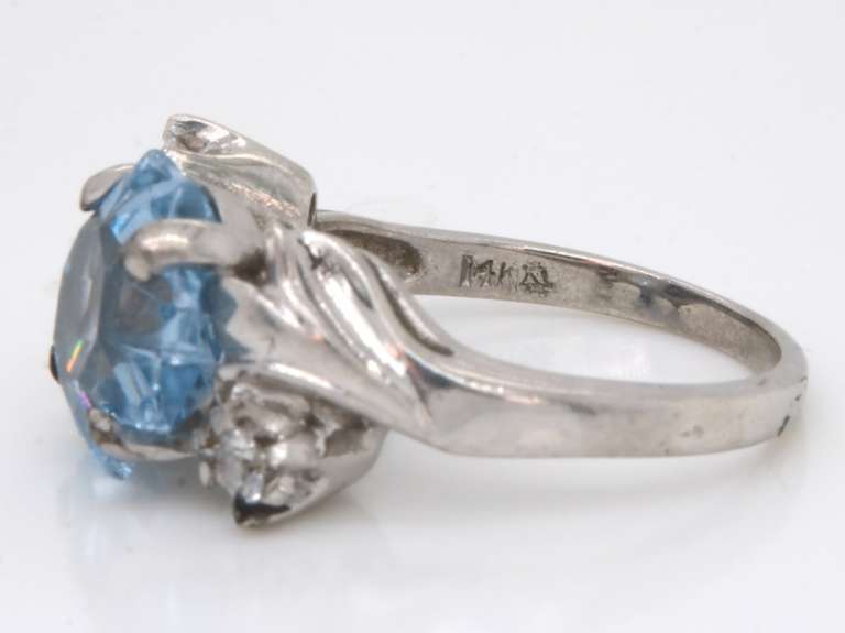Pleasing White Gold Blue and White CZ Star Ring