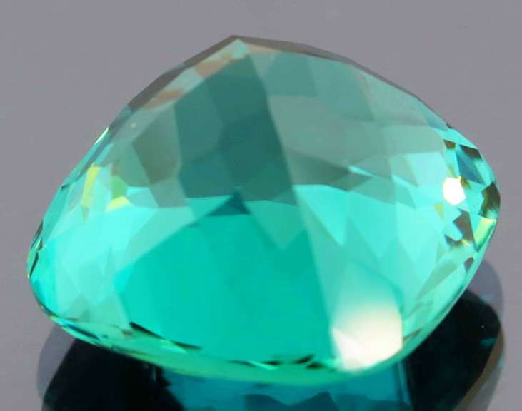 35.51ct top blue green hue created Amethyst