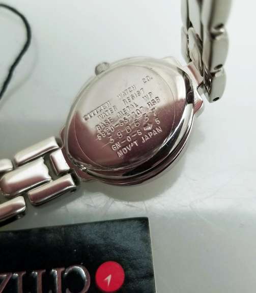 Citizen women’s watch silver dial elegant dress watch stainless steel case and bracelet