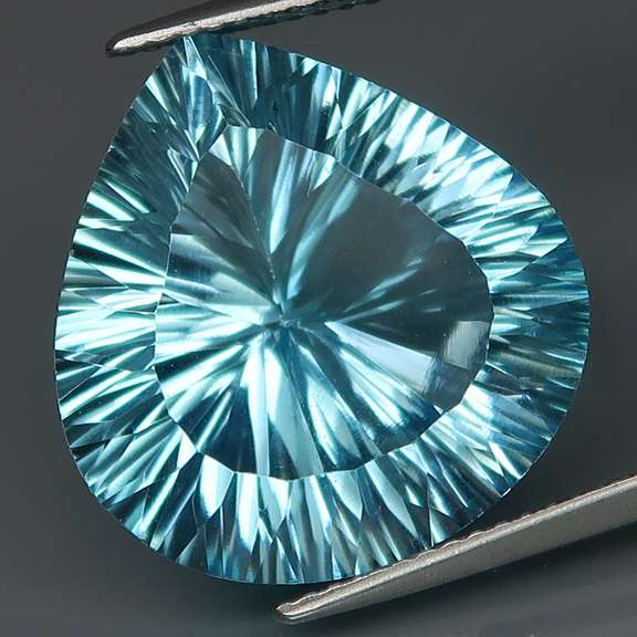 Incredible 20.51ct high fire concave cut Topaz