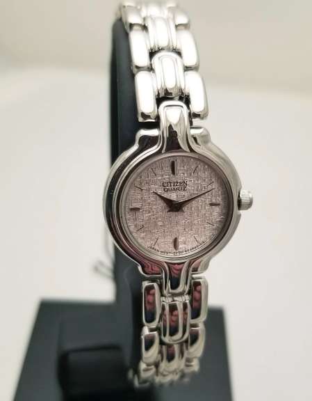 Citizen women’s watch silver dial elegant dress watch stainless steel case and bracelet