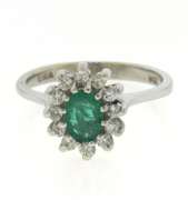 Graceful White Gold Emerald and Diamond Halo Ring
