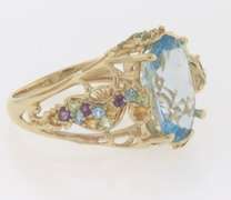 Powerful Blue Topaz, Amethyst, Peridot and Citrine Yellow Gold Ring