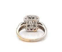Dazzling 18kt WG Round & Baguette Cut Diamond Ring