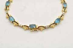 LADIES 14 KT YELLOW GOLD TOPAZ AND DIAMOND BRACELET