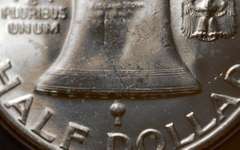 Lot Of 2 Graded Franklin Half Dollars.