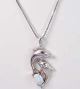 Shiny Opal Set in Sterling Silver Dolphin Pendant With Diamond Accent Eyes.