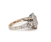 Dazzling 18kt WG Round & Baguette Cut Diamond Ring
