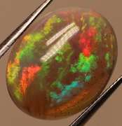 Glowing! 2.27ct full cover multi-pattern black Opal