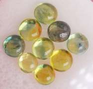Glittering 5.49ct green and gold Sapphire cabochon set