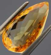 Vibrant 7.89ct golden orange pear cut Citrine