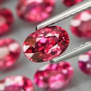 Amazing 8.22ct oval cut violet pink Garnet set