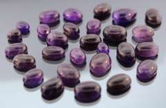 Heavy 259ct collection of deep violet Amethyst cabochons