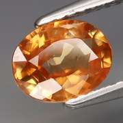 Tremendous 1.59ct mandarin orange Tanzanian Zircon