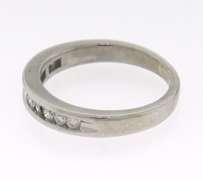 Brilliant White Gold Channel Set Diamond Band