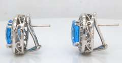 Powerful White Gold Cushion Blue Topaz and Diamond Earrings