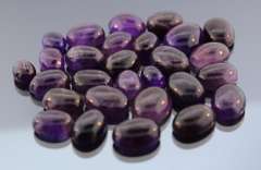 Heavy 259ct collection of deep violet Amethyst cabochons