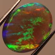 Glowing! 2.27ct full cover multi-pattern black Opal