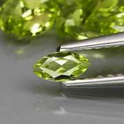 Dazzling 7.57ct untreated apple green Peridot set