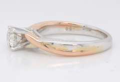 Powerful Two-Tone Gold 0.50CT Solitaire Diamond Ring