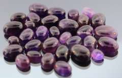 Heavy 285ct collection of deep violet Amethyst cabochons