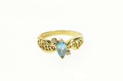 14K Yellow Gold Oval Blue Topaz Diamond Accent Filigree Ring