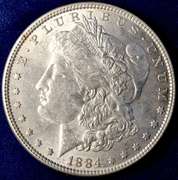 2 1884 Morgan Silver Dollars P & O Mint Marks. About Uncirculated.