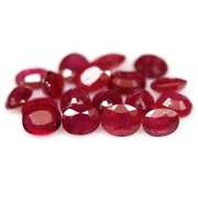 Vibrant 8.30ct oval cut imperial red Ruby set