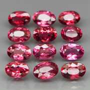 Amazing 8.22ct oval cut violet pink Garnet set