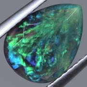 Silky 1.56ct floral fairy fire flashing Black Opal