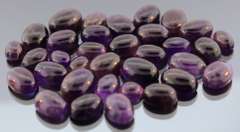 Heavy 270ct collection of deep violet Amethyst cabochons