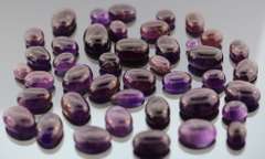 Huge! 293ct collection of deep violet Amethyst cabochons