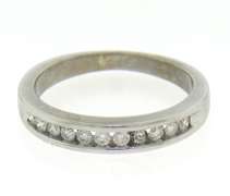 Brilliant White Gold Channel Set Diamond Band