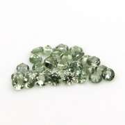 Fantastic 6.24ct diamond cut GREEN Sapphire set