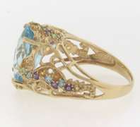 Powerful Blue Topaz, Amethyst, Peridot and Citrine Yellow Gold Ring