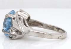 Pleasing White Gold Blue and White CZ Star Ring