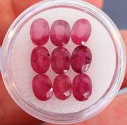 Heavy 10.74ct oval cut Ruby set