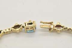 LADIES 14 KT YELLOW GOLD TOPAZ AND DIAMOND BRACELET