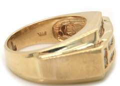 Masterpiece Yellow Gold Baguette and RBC Diamond Ring