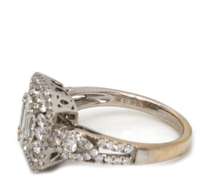 Dazzling 18kt WG Round & Baguette Cut Diamond Ring