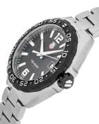 Tag Heuer Swiss Black Dial. New In Box.