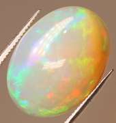 Vibrant 3.27ct rolling flashing Welo Opal