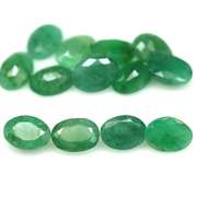 Rich emerald green 9.05ct 13pc emerald set